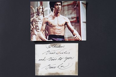 Lot 735 - A Bruce Lee signed and inscribed paper