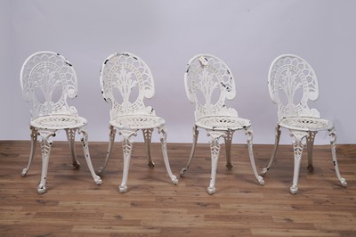 Lot 158 - A set of four Victorian style garden bistro cast metal chairs and two tables