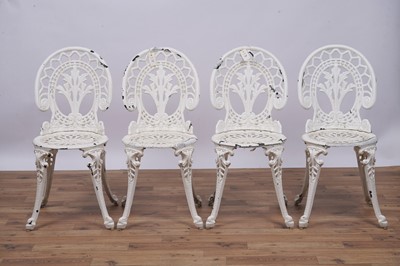 Lot 158 - A set of four Victorian style garden bistro cast metal chairs and two tables