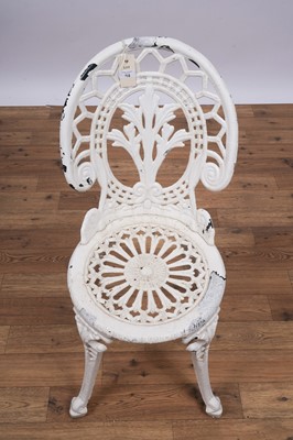 Lot 158 - A set of four Victorian style garden bistro cast metal chairs and two tables