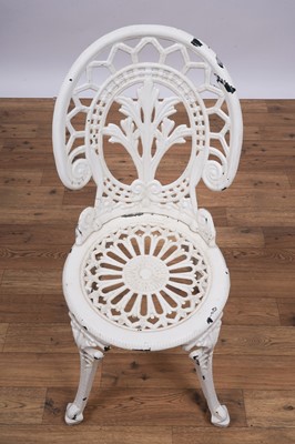 Lot 158 - A set of four Victorian style garden bistro cast metal chairs and two tables