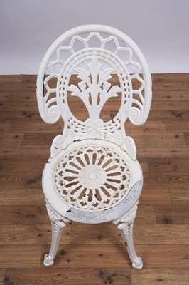 Lot 158 - A set of four Victorian style garden bistro cast metal chairs and two tables