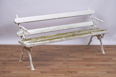 Lot 163 - A Coalbrookdale style white painted cast metal and wood garden bench