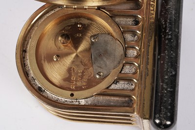 Lot 228 - A Bulgari 'Duomo' brass cased miniature clock