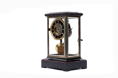 Lot 210 - A black onyx and marble four glass mantle clock