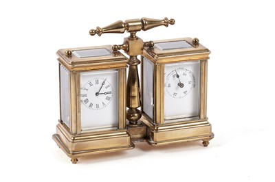 Lot 231 - An early 20th Century brass cased clock and barometer desk compendium