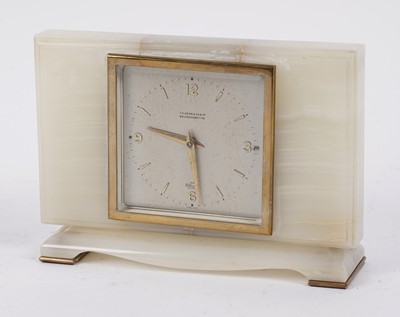 Lot 215 - An Elliot onyx mantle clock; and five others