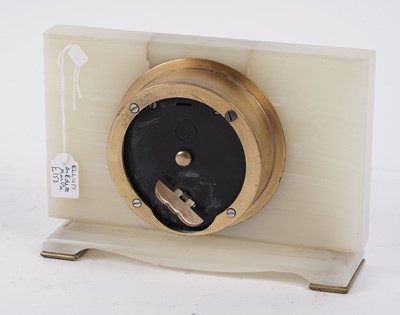 Lot 215 - An Elliot onyx mantle clock; and five others