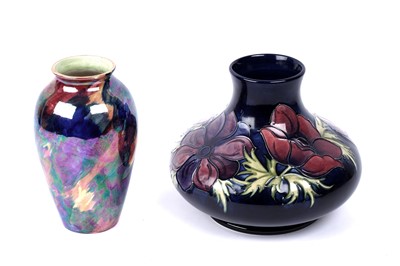 Lot 363 - A Moorcroft ‘Anemone’ vase; and a Maling England lustre 'Storm' pattern vase