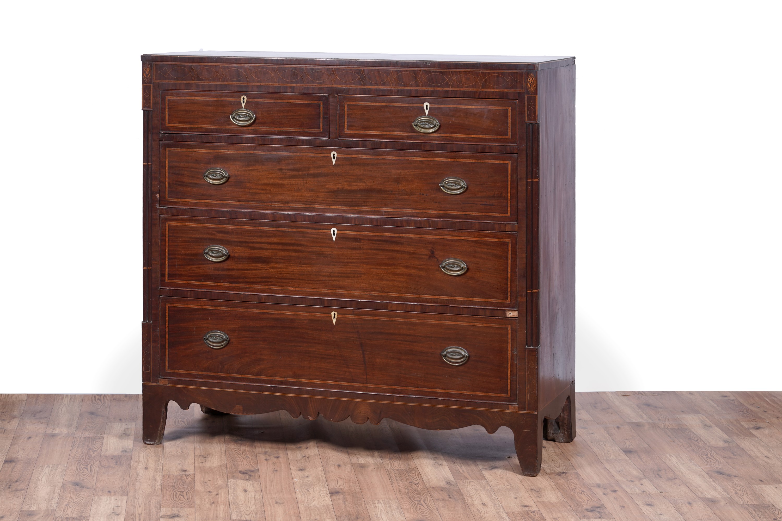 Lot 9 - A substantial George III inlaid mahogany chest