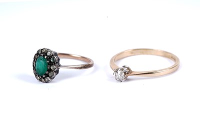 Lot 19 - A single stone diamond ring; and a cluster dress ring