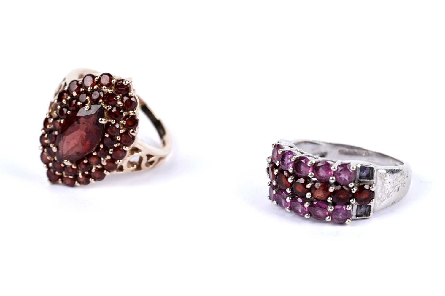 Lot 44 - A garnet cluster dress ring; and another ring