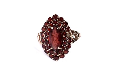 Lot 44 - A garnet cluster dress ring; and another ring