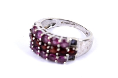 Lot 44 - A garnet cluster dress ring; and another ring