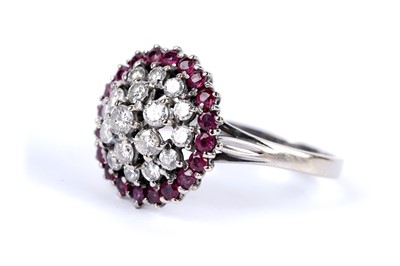 Lot 14 - A diamond and ruby cluster dress ring