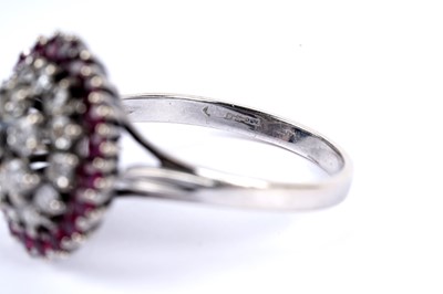 Lot 14 - A diamond and ruby cluster dress ring