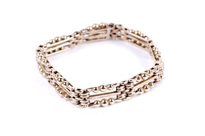 Lot 22 - A yellow gold fancy link chain bracelet