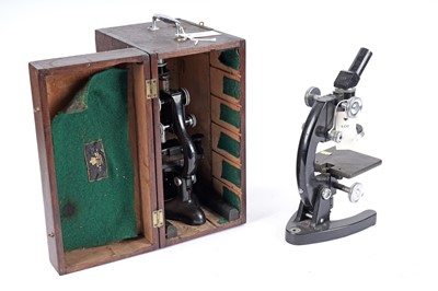 Lot 393 - A Bausch & Lomb Optical Co microscope; and another microscope