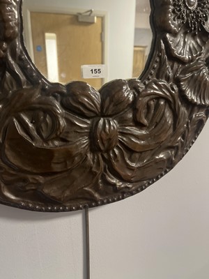 Lot 155 - An early 20th Century Arts and Crafts copper mirror