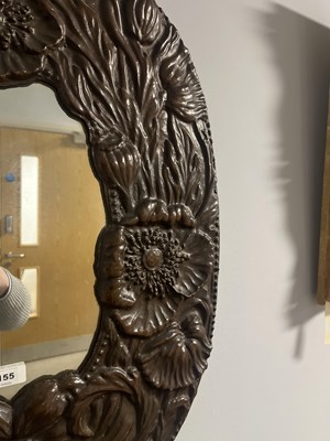 Lot 155 - An early 20th Century Arts and Crafts copper mirror