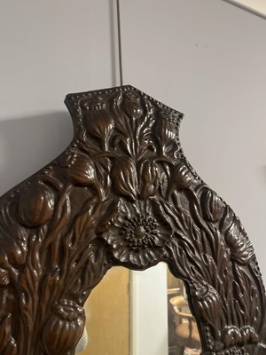 Lot 155 - An early 20th Century Arts and Crafts copper mirror