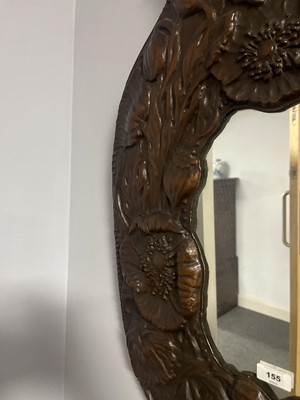 Lot 155 - An early 20th Century Arts and Crafts copper mirror