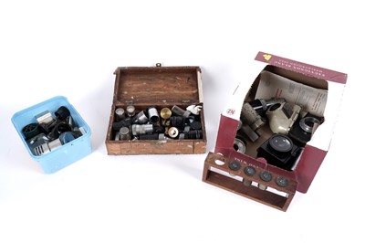 Lot 401 - A collection of vintage microscope lenses and accessories