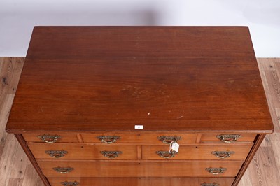 Lot 57 - An early 20th Century walnut chest of drawers