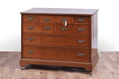 Lot 57 - An early 20th Century walnut chest of drawers