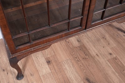 Lot 48 - Two tables; and a bookcase