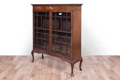 Lot 48 - Two tables; and a bookcase