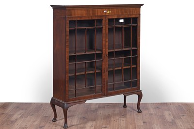 Lot 48 - Two tables; and a bookcase