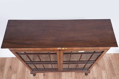 Lot 48 - Two tables; and a bookcase