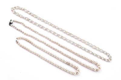 Lot 92 - A graduated single strand faux pearl necklace and three others