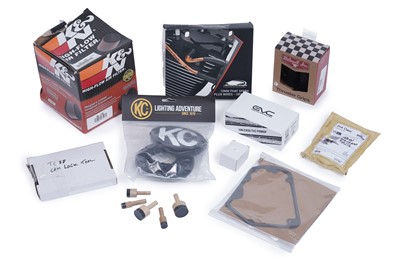 Lot 464 - A collection of boxed motorcycle parts and accessories, mostly for Harley Davidson