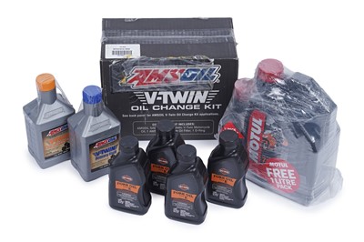 Lot 494 - A boxed Amsoil V-Twin oil change kit; and a quantity of engine/other oil