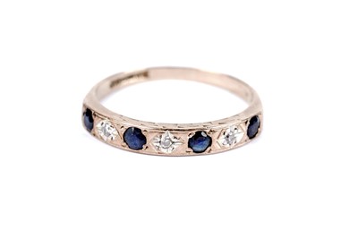 Lot 46 - A sapphire and diamond half hoop eternity ring; and another