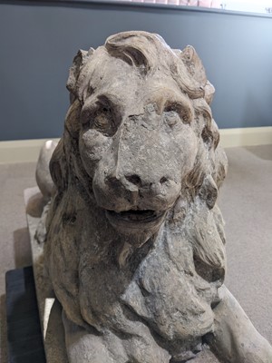 Lot 1260 - A Coade stone garden sculpture of a recumbent lion