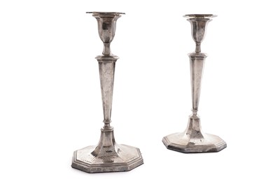 Lot 95 - A pair of George III silver candlesticks