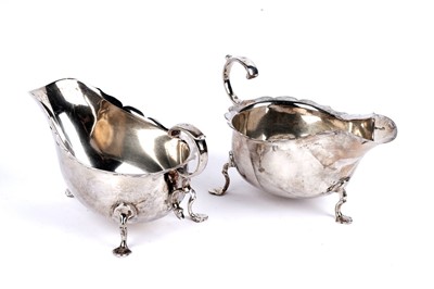 Lot 300 - A pair of George V silver sauce boats by Martin Hall & Co