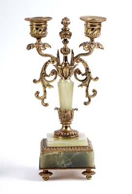 Lot 171 - A French onyx and gilt metal clock and garniture by Mesnard & Fils