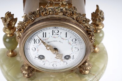 Lot 171 - A French onyx and gilt metal clock and garniture by Mesnard & Fils
