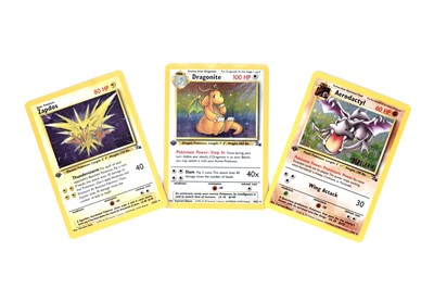 Lot 212 - Three first edition shiny Fossil set Pokémon cards