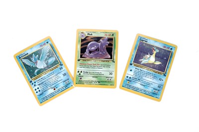 Lot 215 - Three first edition shiny Fossil set Pokémon cards