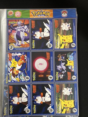 Lot 328 - A collection of Pokémon promotional cards and materials; and other items