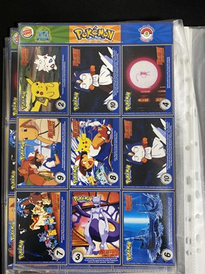 Lot 328 - A collection of Pokémon promotional cards and materials; and other items