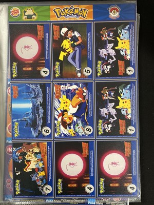 Lot 328 - A collection of Pokémon promotional cards and materials; and other items