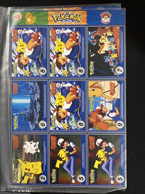 Lot 328 - A collection of Pokémon promotional cards and materials; and other items