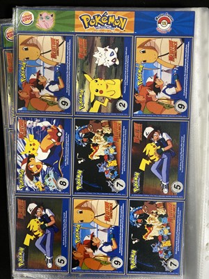 Lot 328 - A collection of Pokémon promotional cards and materials; and other items