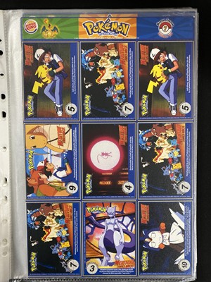 Lot 328 - A collection of Pokémon promotional cards and materials; and other items